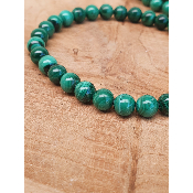 Bracelet sur fil élastique  malachite et perles de 6mm